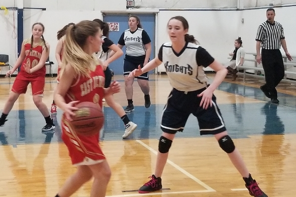 Girls playing basketball